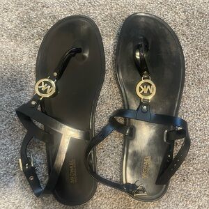 Michael Kores black shiny sandals